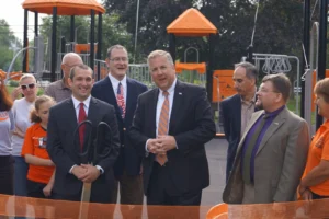 Medicor Cardiology presents an automated external defibrillator (AED) to Somerville Recreation officials at community park ceremony