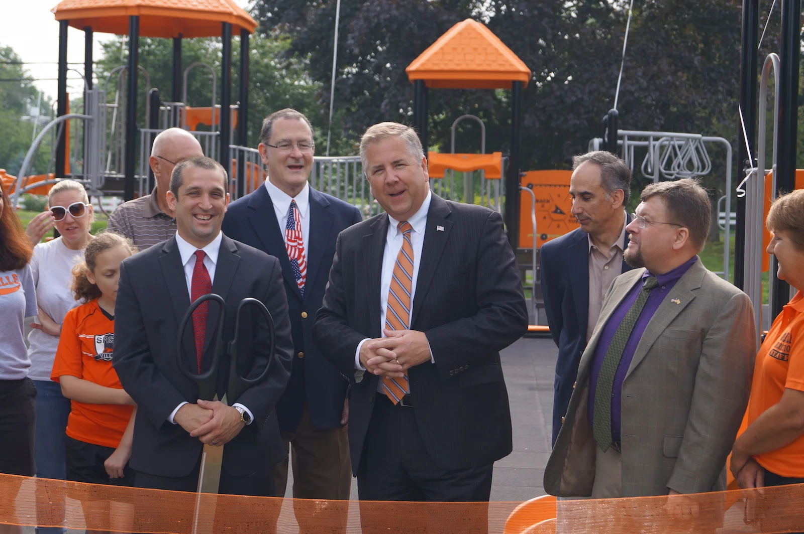 Medicor Cardiology presents an automated external defibrillator (AED) to Somerville Recreation officials at community park ceremony