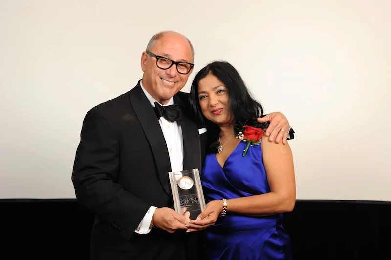 Dr. Kulkarni Accepting EWNJ Award 2014