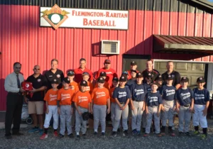 Medicor Cardiology donating AED defibrillator to Flemington-Raritan youth baseball team