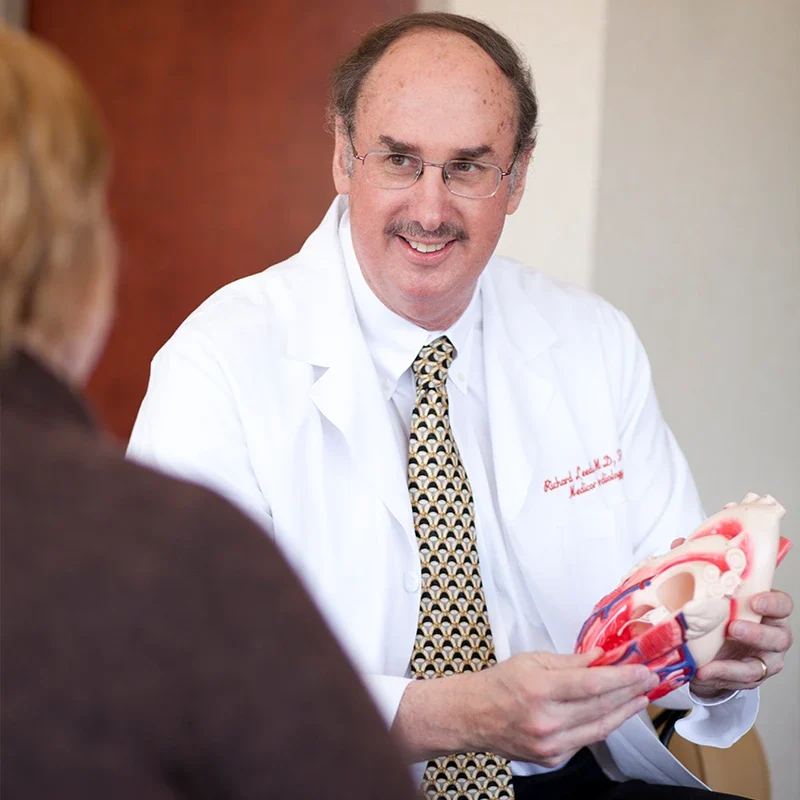 Cardiologist explaining anticoagulation therapy and Coumadin treatment to patient in New Jersey